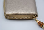 Gucci Gold Grained Leather Bamboo Zippy Wallet