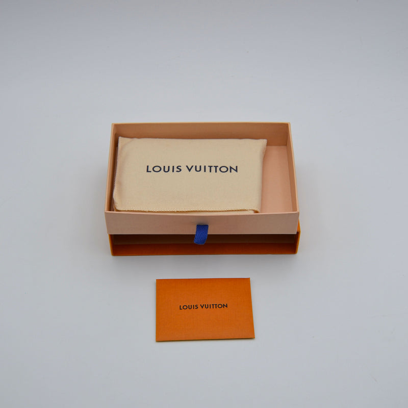 Louis Vuitton Capucines Compact Trifold Wallet