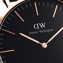 Reloj clásico Dover negro y oro rosa