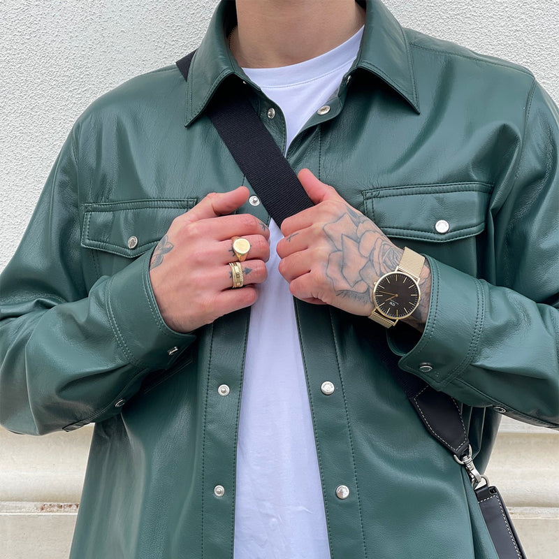 Reloj clásico de malla de ónix y oro negro