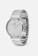 Reloj Unitone plateado con enlace de piano clásico