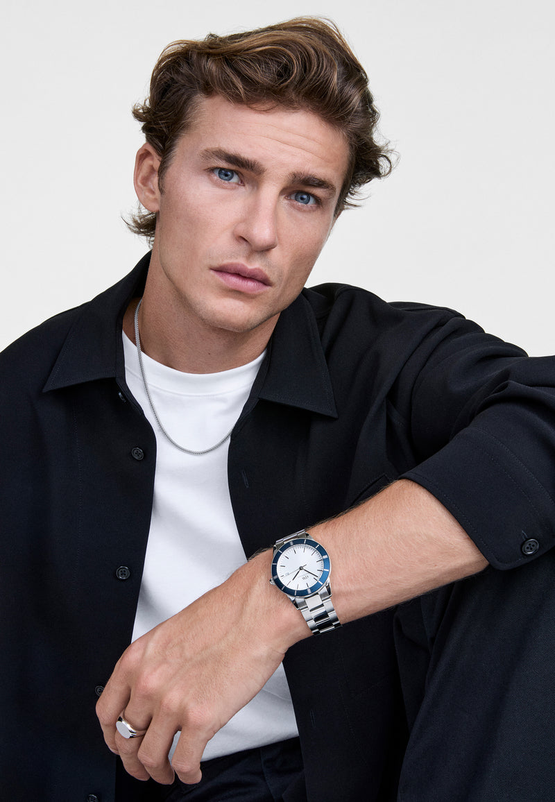 Reloj icónico Paradigma Link blanco con bisel azul rayos de sol y plateado