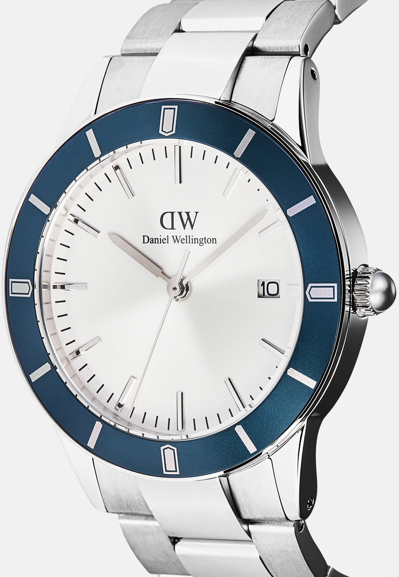 Reloj icónico Paradigma Link blanco con bisel azul rayos de sol y plateado