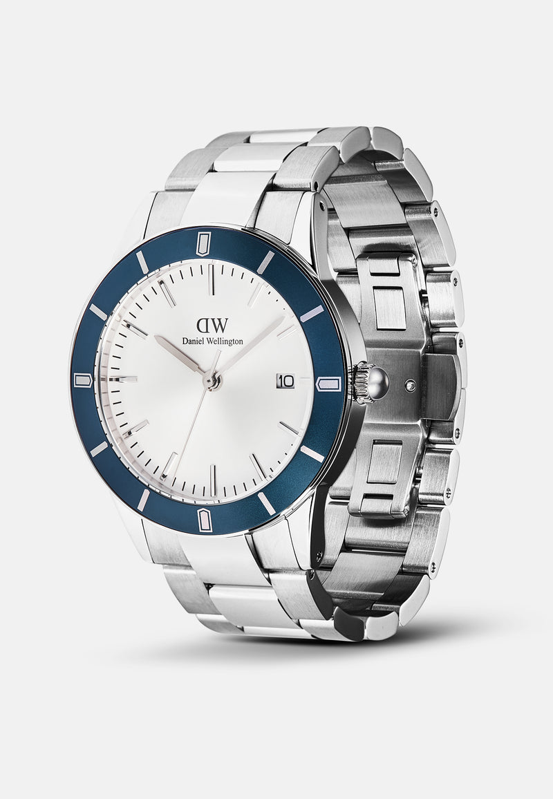 Reloj icónico Paradigma Link blanco con bisel azul rayos de sol y plateado