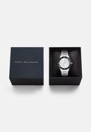 Icónico reloj plateado con bisel negro y rayos de sol en blanco Paradigma Link