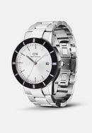 Icónico reloj plateado con bisel negro y rayos de sol en blanco Paradigma Link