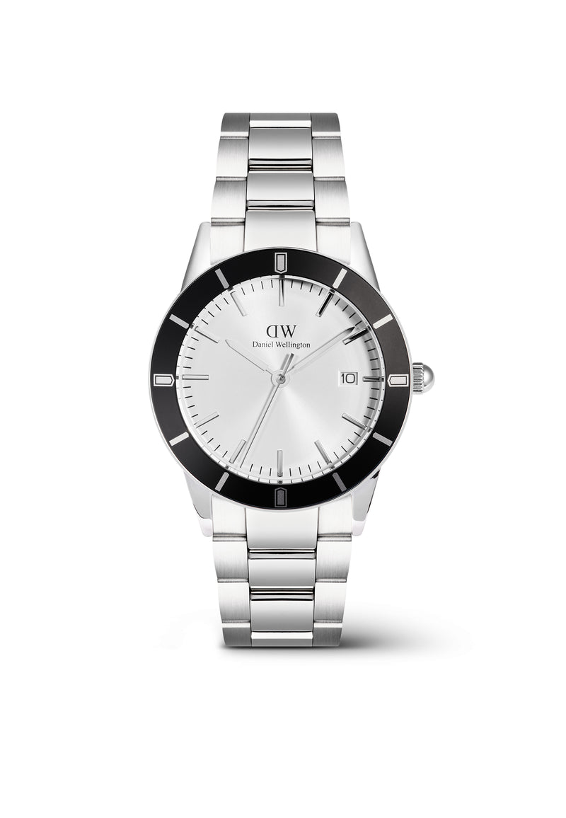 Icónico reloj plateado con bisel negro y rayos de sol en blanco Paradigma Link