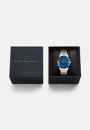 Reloj plateado con bisel azul y esmalte azul icónico Paradigma Link