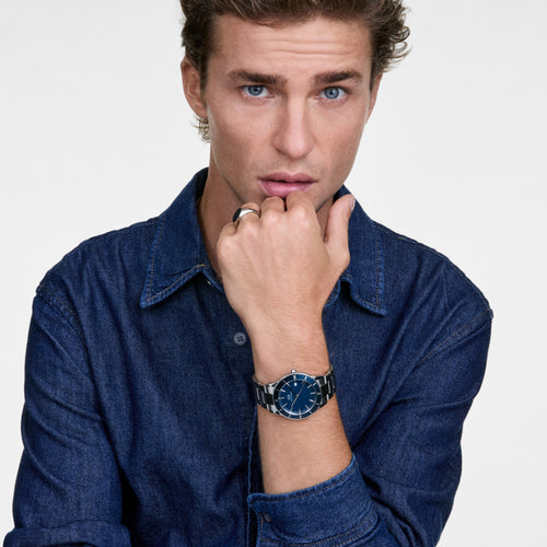 Reloj plateado con bisel azul y esmalte azul icónico Paradigma Link