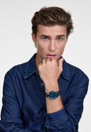 Reloj plateado con bisel azul y esmalte azul icónico Paradigma Link