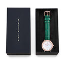 Reloj de oro rosa con bisel cristalino, cocodrilo verde, blanco y fregona
