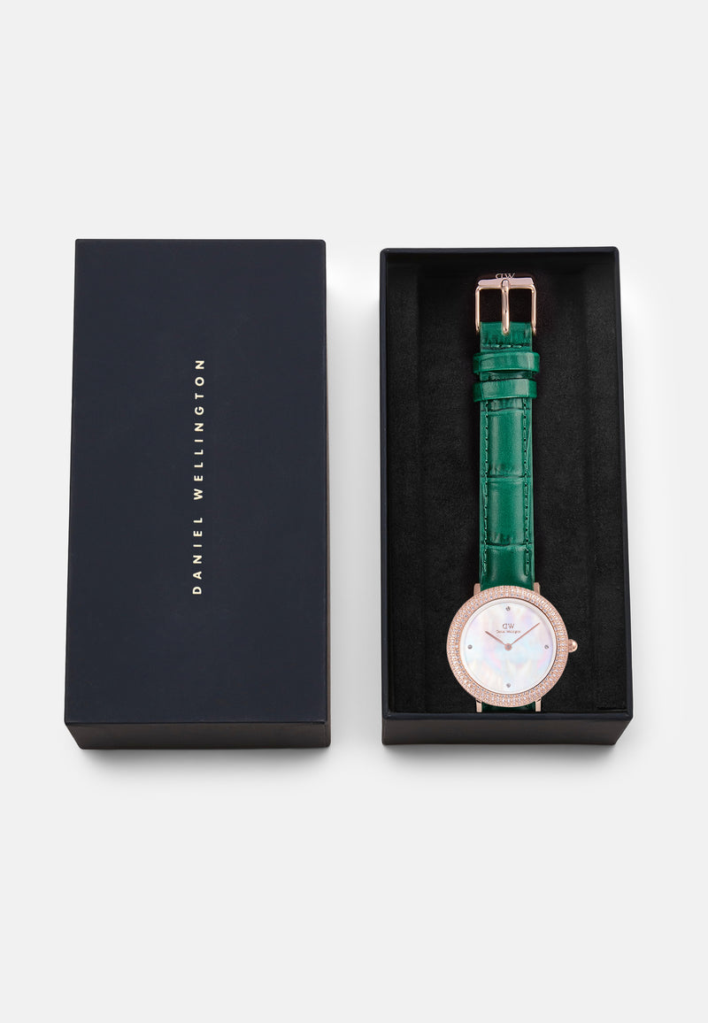 Reloj de oro rosa con bisel cristalino, cocodrilo verde, blanco y fregona