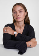 Reloj de oro rosa con bisel cristalino, cocodrilo negro, blanco y fregona