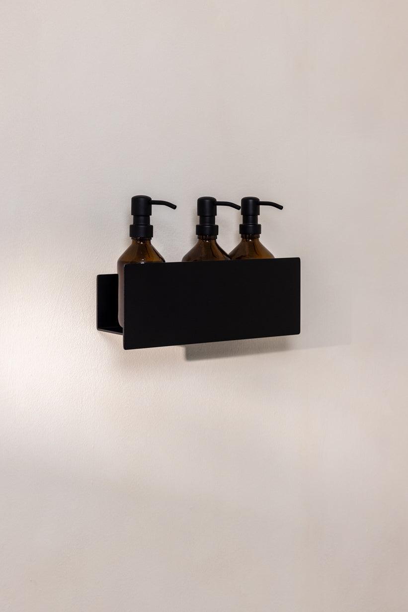 SHEA Duschablage mit drei braunen Flaschen für Düschgel und Shampoo, ideal para un elegante elemento de baño.