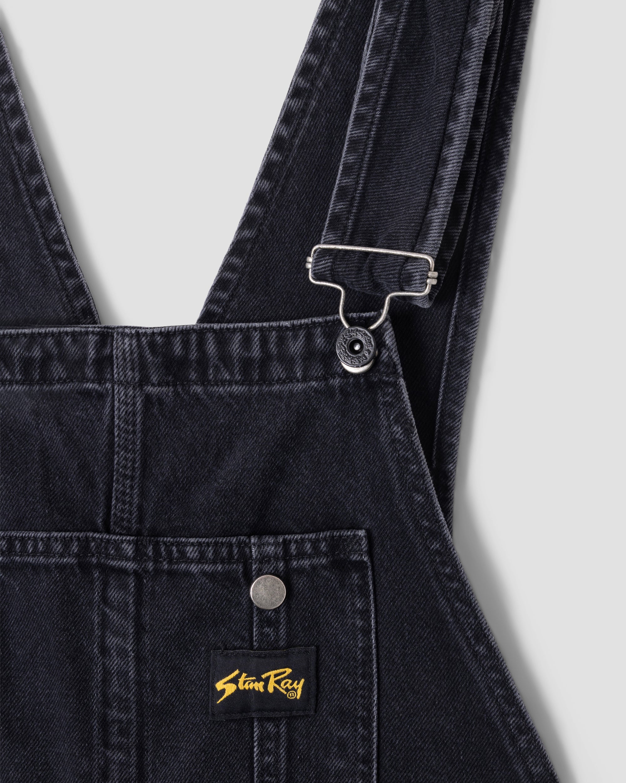 Babero Earls - Denim negro lavado a la piedra