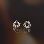 Pendientes “Cruzada” Oro amarillo y oro blanco 375/1000