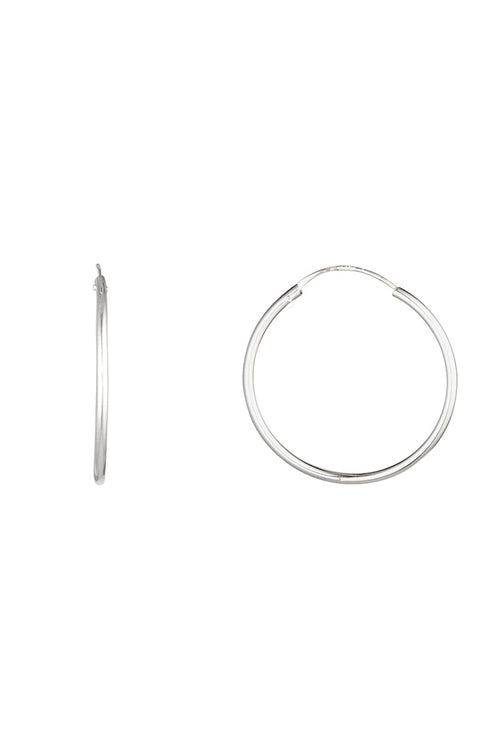 Boucles d'oreilles "Sublime créoles " 20 mm Or Blanc 375/1000