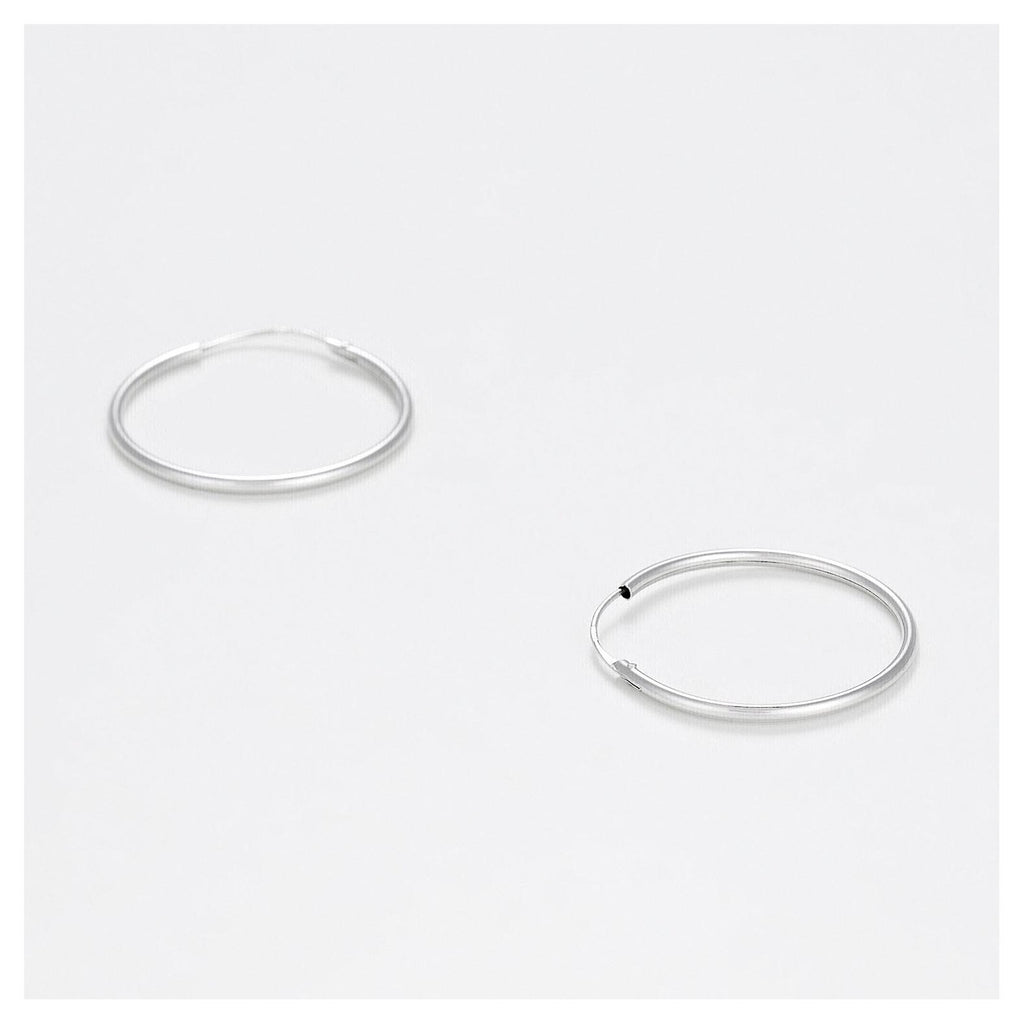 Boucles D'Oreilles "Sublime Créoles " 20 Mm Or Blanc 375/1000