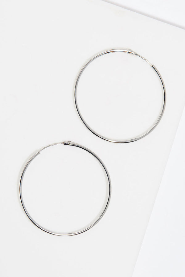 Boucles D'Oreilles "Créoles Lisses" 30 Mm Or Blanc 375/1000