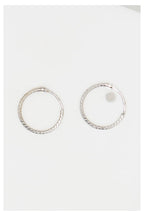 "10 mm Twisted Hoops" Earrings - 375/1000 White Gold