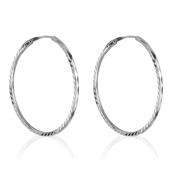 Boucles D'oreilles "Créoles Twistées" Or Blanc 375/1000