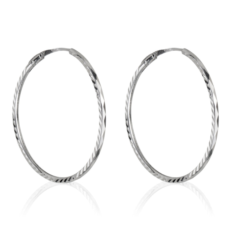 Boucles D'oreilles "Créoles Twistées" Or Blanc 375/1000