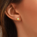 Once aretes de ópalo del Pacífico