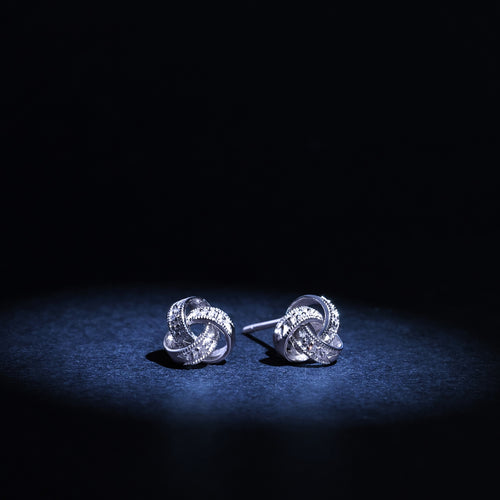 Boucles D'Oreilles "Joli Noeud" D0,02Ct/6 - Or Blanc 375/1000