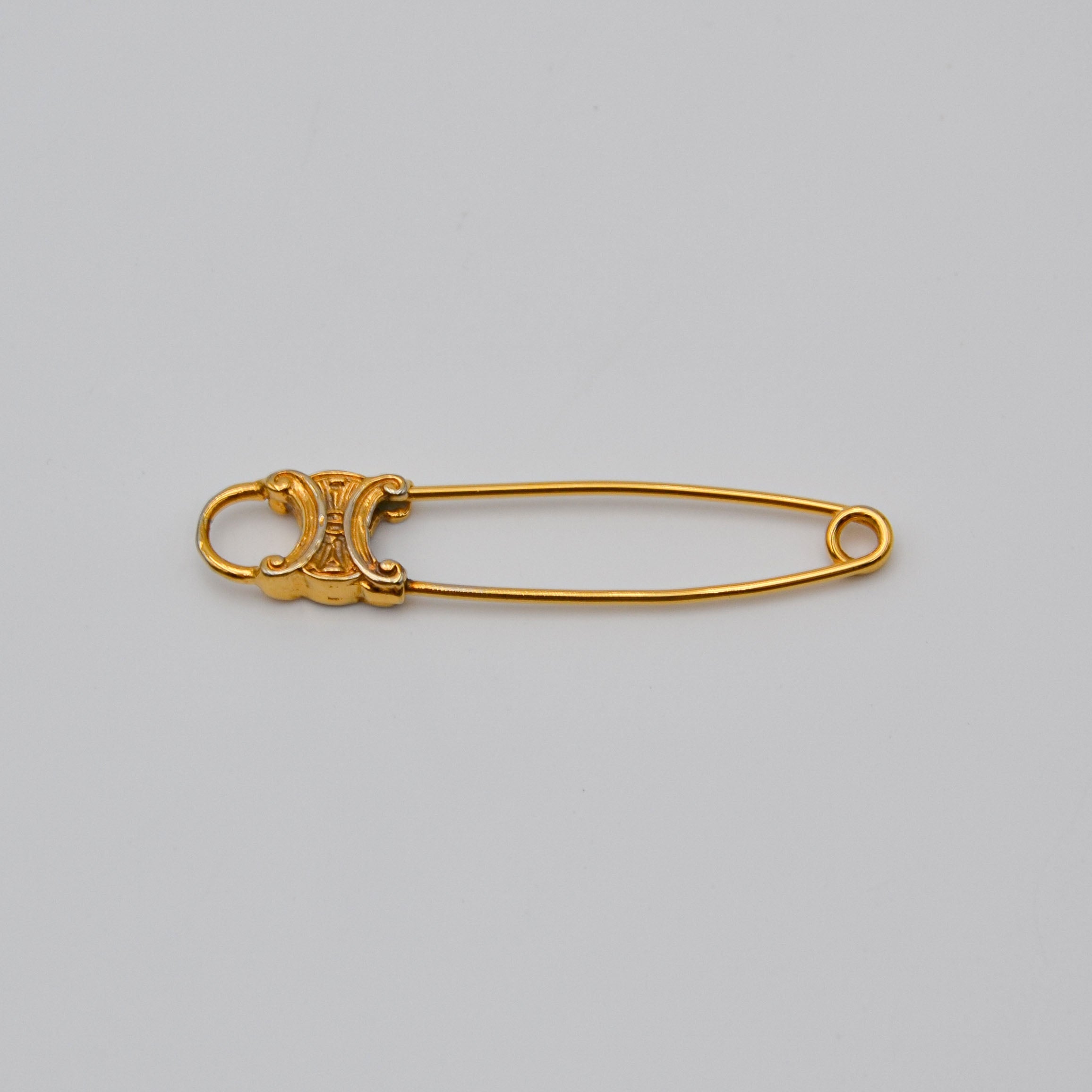 Broche Céline Alfiler Logo Triomphe