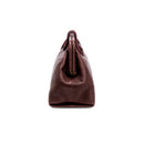 Burgundy in a shade of dark cherry leather handbag with a rope closure on a white background