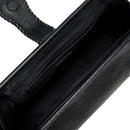 Close-up of a black leather bag with a white interior and card slots