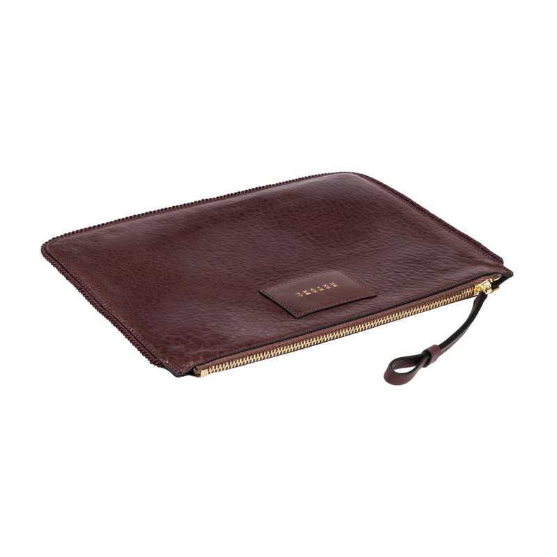 Burgundy leather in a shade of dark cherry inner bag  with gold zipper on a white background