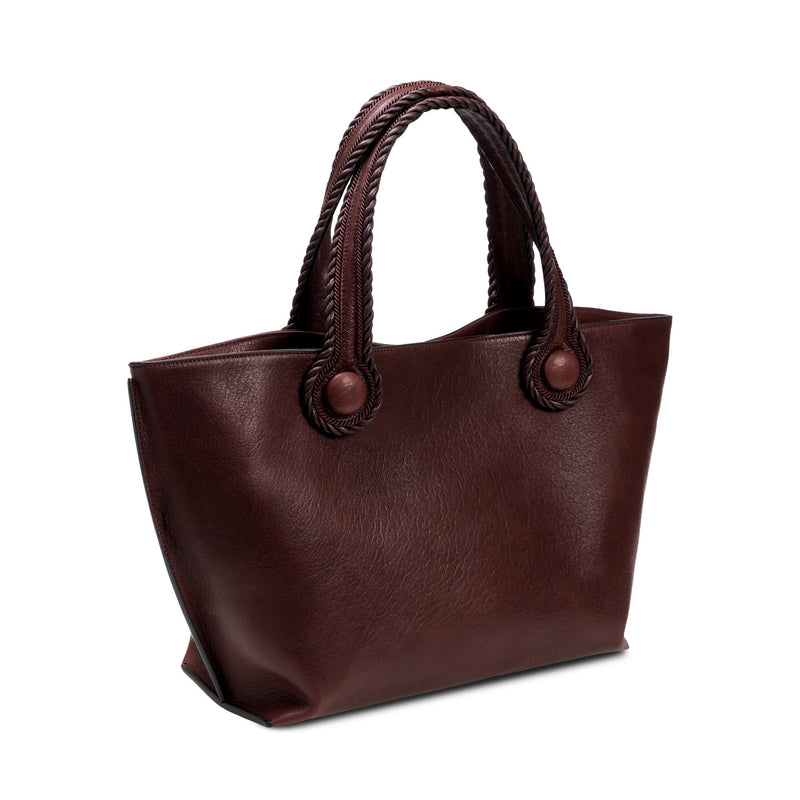 Burgundy leather in a shade of dark cherry tote bag with rope handles on a white background
