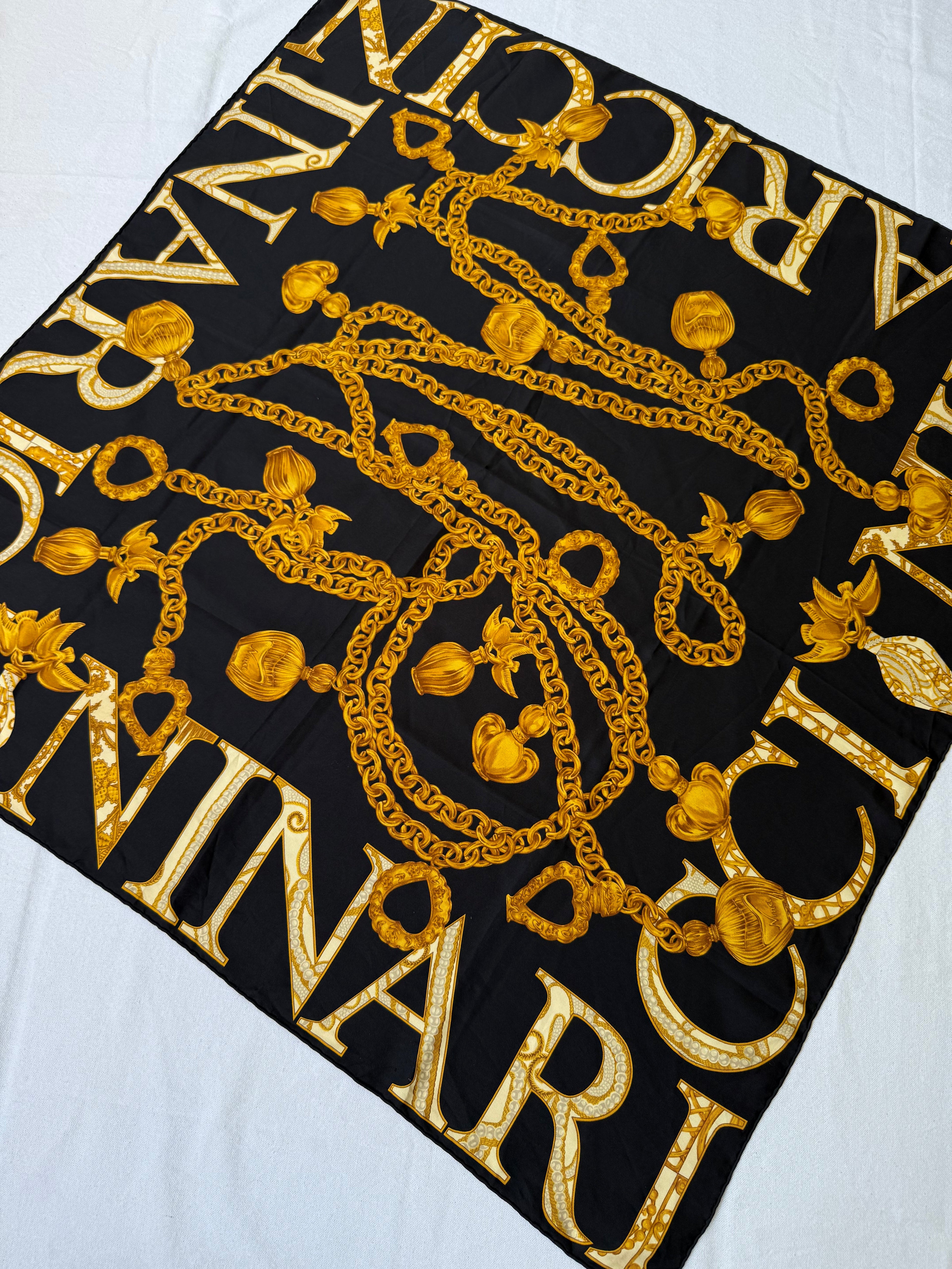 Bufanda Nina Ricci – Cadenas Y Monograma