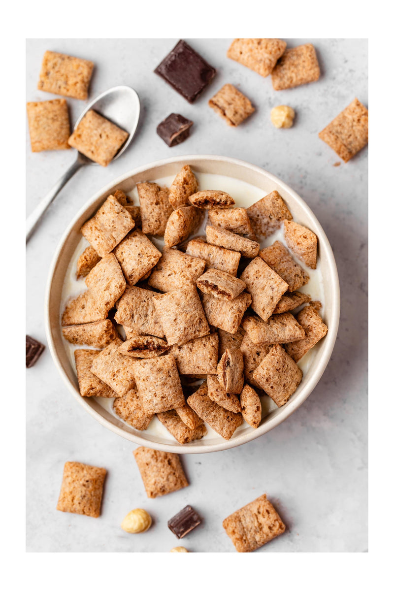 Voici les Fourrées de Funkie, les céréales de notre enfance revisitées à la composition irréprochable.

Craquez pour leur cœur fondant cacao-noisette dans une délicieuse céréale croustillante : le goût de l'enfance 2.0 !