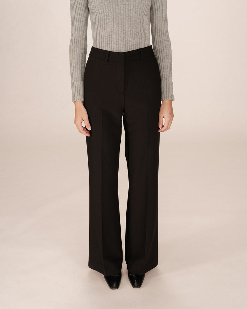 Pantalones de sastre de campana negros de Singer