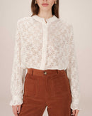 Blusa con vuelo crudo