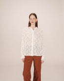 Blusa con vuelo crudo