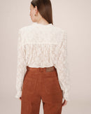Blusa con vuelo crudo