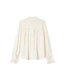 Blusa con vuelo crudo