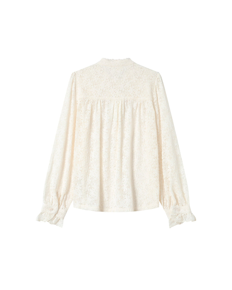 Blusa con vuelo crudo