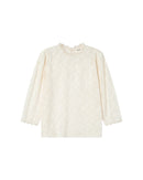 Blusa Stella color crudo con cuello levantado
