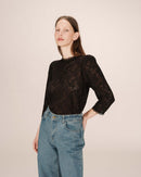 Blusa negra con cuello levantado Stella