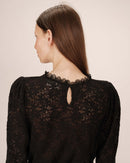 Blusa negra con cuello levantado Stella