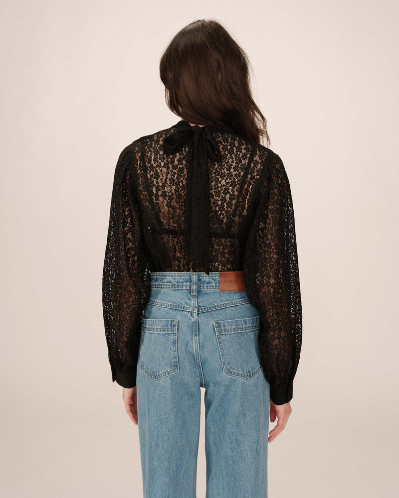 Blusa negra con cuello tipo coño Sicilia