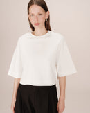 Top corto con estrella marfil