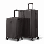 Duo of GYL Intemporelle black rigid suitcases with ribbed shells and telescopic handles. #black_color