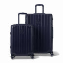 Two GYL Intemporelle navy rigid suitcases, cabin and hold format, with extended trolley handle. #navy_color