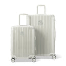 Two GYL Intemporelle sand hard suitcases, cabin and hold format, with extended trolley handle. #sand_color