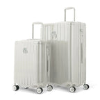 Duo of GYL Intemporelle sand hard suitcases with ribbed shells and telescopic handles. #sand_color